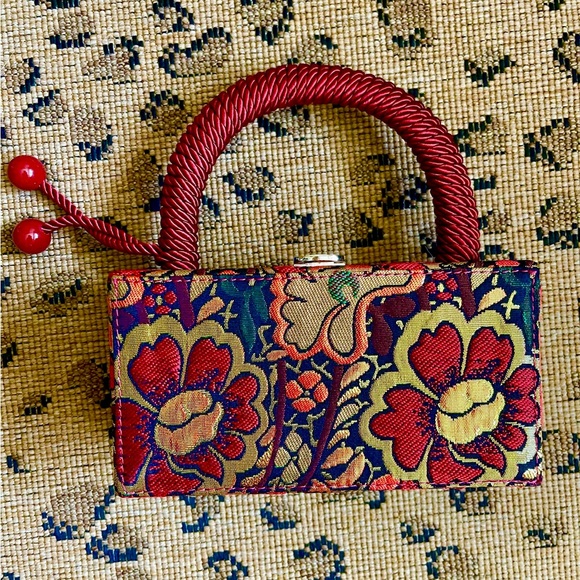 Tuckernuck Handbags - Tuckernuck Red and Blue Floral Clutch